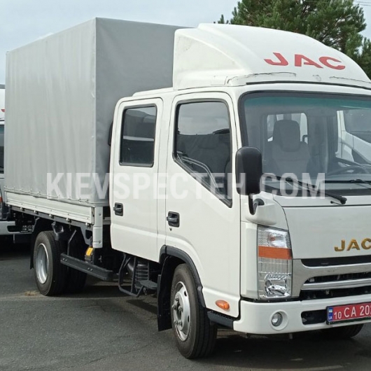 Бортовой автомобиль JAC N56DC с тентом